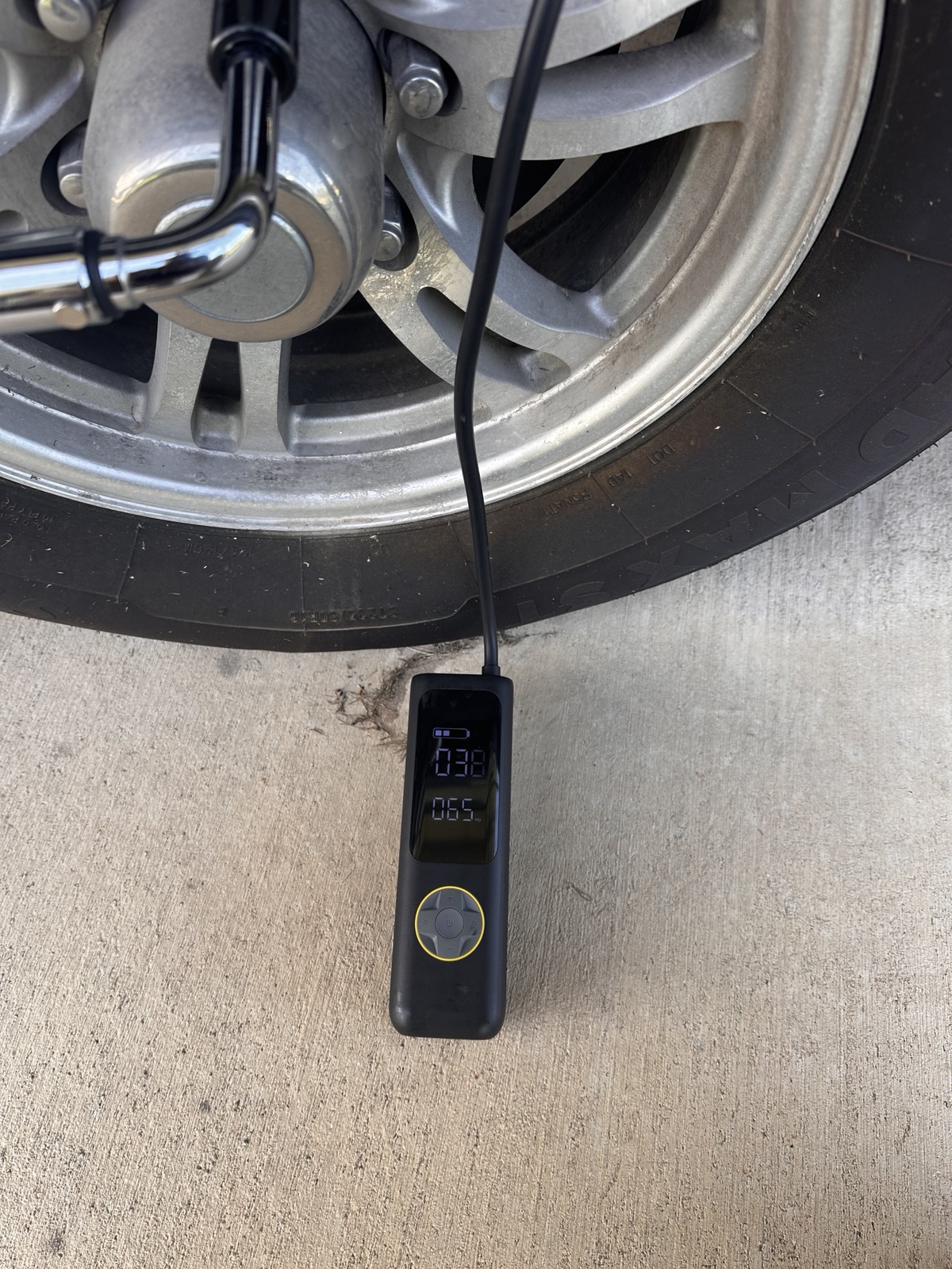 Digital tire gauge reading 38 PSI on a trailer tire spec'd for 65 PSI &mdash; found at pre-trip inspection